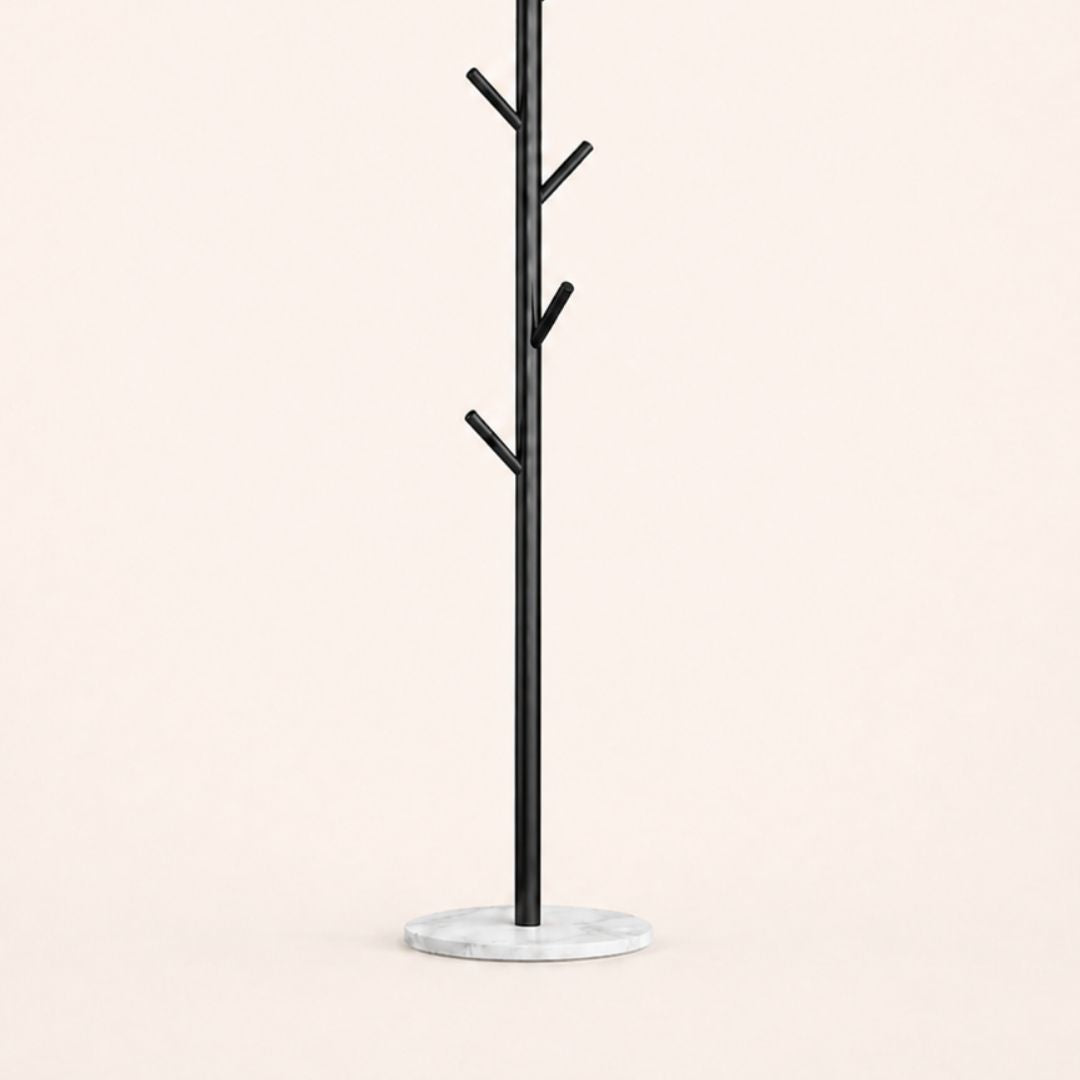 Porte-manteau sur pied noir en forme d'arbre à base blanche